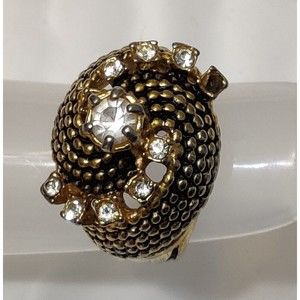 ring gold toned 9 zirconias size 7
